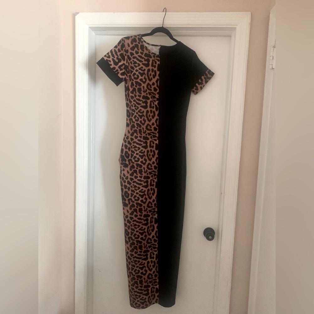 Spandex leopard print dress with pockets. 95% Polyester 5% Spandex